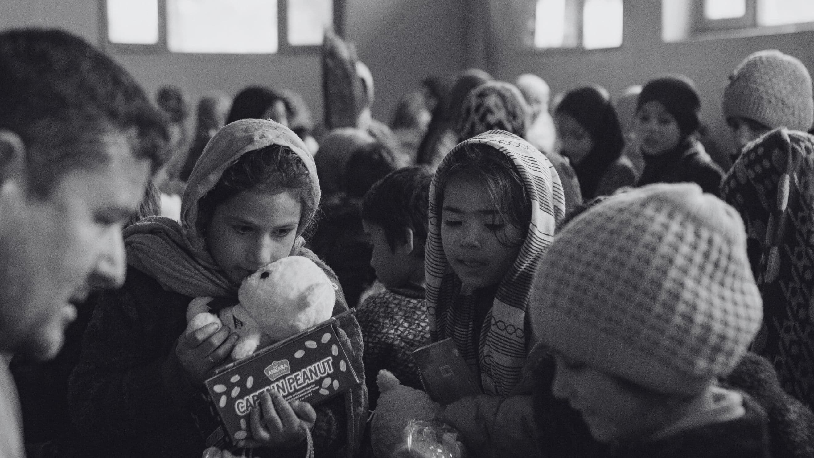 Children with stuffed toys